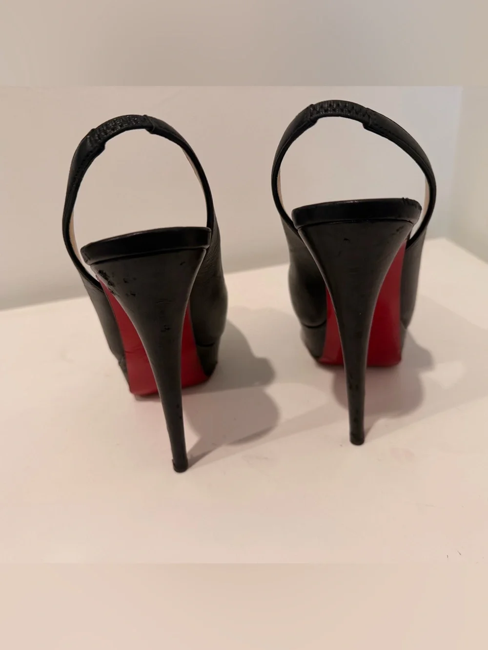 Christian Louboutin Black Leather Peep-Toe Slingback Pumps with Red Soles
